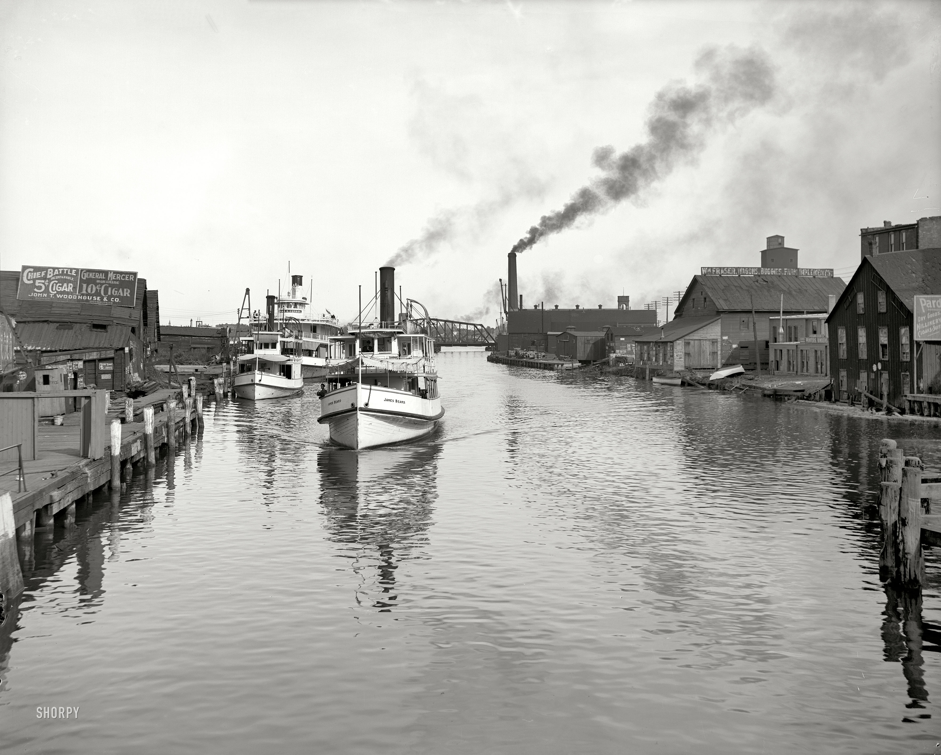 Circa 1905. "Port Huron, Michigan -- Black River."  An array of interesting signage in this view. 8x10 glass negative, Detroit Publishing Co. View full size.