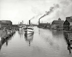 Circa 1905. "Port Huron, Michigan -- Black River."  An array of interesting signage in this view. 8x10 glass negative, Detroit Publishing Co. View full size.
Many Men Smoke But Fu ManchuA blurry ad for Sure Shot Chewing Tobacco appears on the wall of the shack-like structure at the extreme left of the photo, I found 2 advertisements for that product. One is a tri-fold advertising counter card . The other a store  display tin that held loose Sure Shot Chewing Tobacco which, I guess, was sold by the pinch to those that imbibed.
Steamer Omar D. Conger met a sad endThe Ferry Steamer Omar D. Conger, named for a US Representative and Senator from Michigan, was built in 1882.  It was destroyed when its boiler exploded at dockside in Port Huron on March 22, 1922.  Four crew members lost their lives and more than a half dozen people on land were injured.  Several waterfront businesses were damaged.  One house was demolished when what was left of the the boiler went through its roof.  Only rubble remained of what had been the Conger.
Damm v. Vincent (Mich. 1917)As suggested by the well-weathered sign, the William Fraser livery stable in Port Huron was in poor condition in 1907 and 1908. That came as a surprise to Ontario resident Charles Damm, who had been convinced by Mr. Fraser in 1907 that it was in good shape when Damm paid Fraser for it, sight unseen. Fraser died right after the sale, and Damm eventually brought a fraud suit against one of Fraser's co-venturers, Edward Vincent. In 1917 the Michigan Supreme Court ruled against Damm, finding that his delay in disaffirming the sale after he learned the true condition of the business barred his fraud claim. 
Grace, James &amp; Omar

Our Inland Seas, by James Cooke Mills, 1910.

At the foot of Lake Huron, where the flow of the broad lake narrows to the St. Clair River, there is a ferry between the city of Port Huron and Sarnia, a town on the Canadian side. Since 1868, the little steamer Grace Dormer has maintained a ferry service, to which was added, in 1873, the ferry-boat James Beard; and in 1882 the new steamer Omar D. Conger was built for the passage of the swift current at this point. The Conger is of two hundred gross tons' register, and is one hundred and two feet long by twenty-six feet beam.




via boatnerd.com.
24 April 1882 - The ferry Hawkins (wooden propeller ferry, 73 foot, 86 gross tons, built in 1873, at Au Sable, Michigan) was renamed James Beard. She had received a thorough overhaul and was put in service between Port Huron, Michigan, and Sarnia, Ontario, on 25 April 1882. She lasted until 1927, when she was abandoned.

Hello, GracieThe Grace Dormer appeared in this previous Shorpy photo.
(The Gallery, Boats & Bridges, DPC)