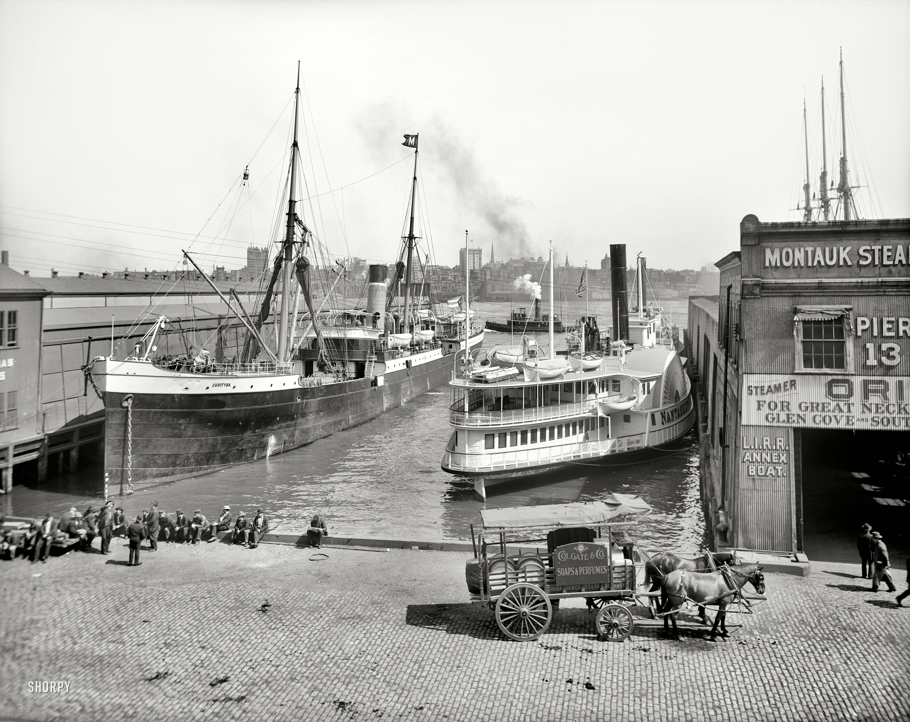 New York circa 1905. "Piers at foot of Wall Street. Steamship Curityba and sidewheeler Nantasket." Not to mention that fine-looking Colgate wagon. 8x10 inch dry plate glass negative, Detroit Publishing Company. View full size.