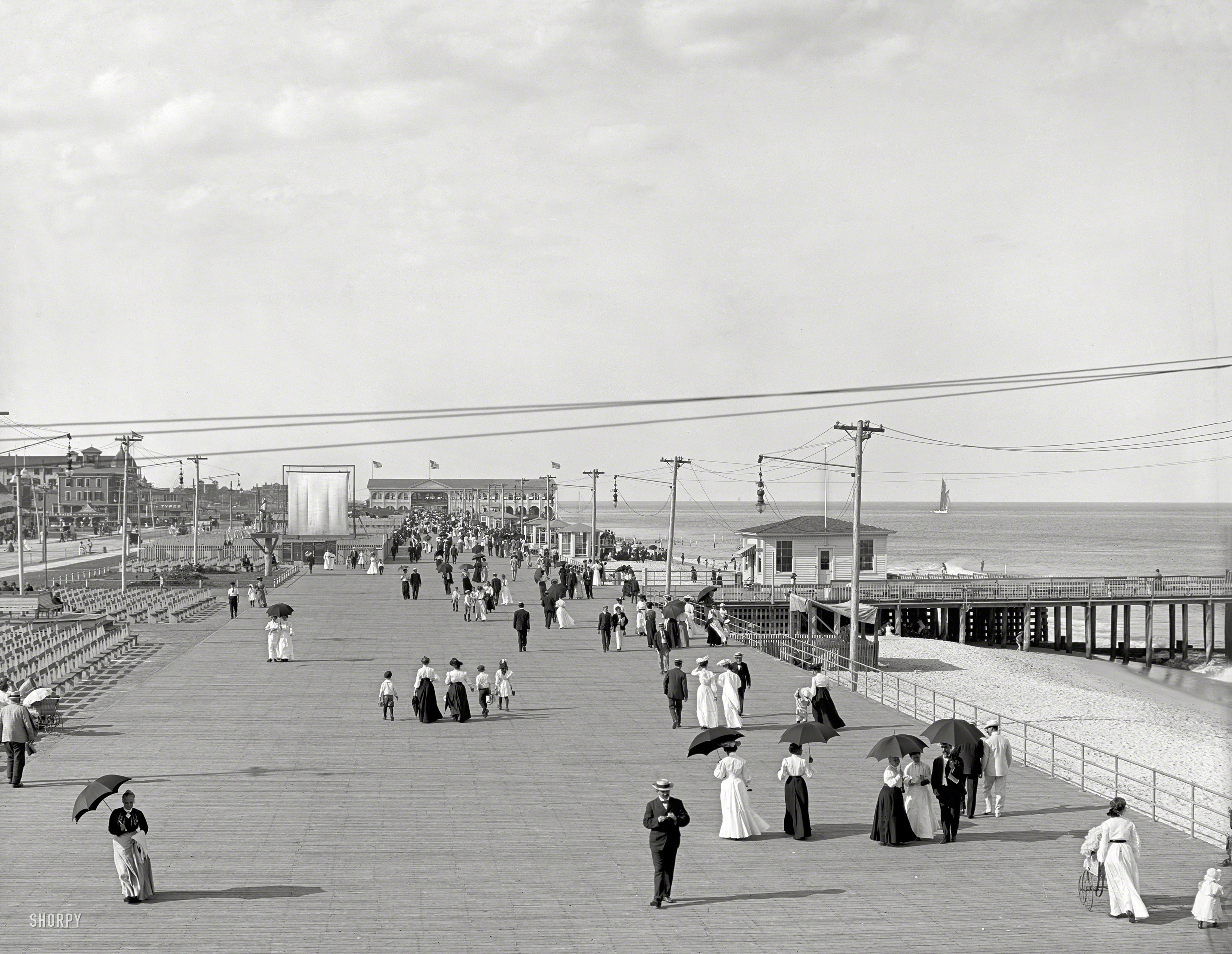 New Jersey circa 1905. "The Boardwalk, Asbury Park." 8x10 inch dry plate glass negative, Detroit Publishing Company. View full size.