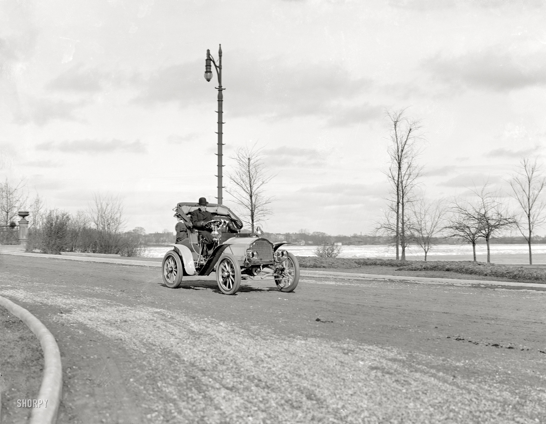 Detroit circa 1908. "Automobile on waterfront road." 8x10 inch dry plate glass negative, Detroit Publishing Company. View full size.