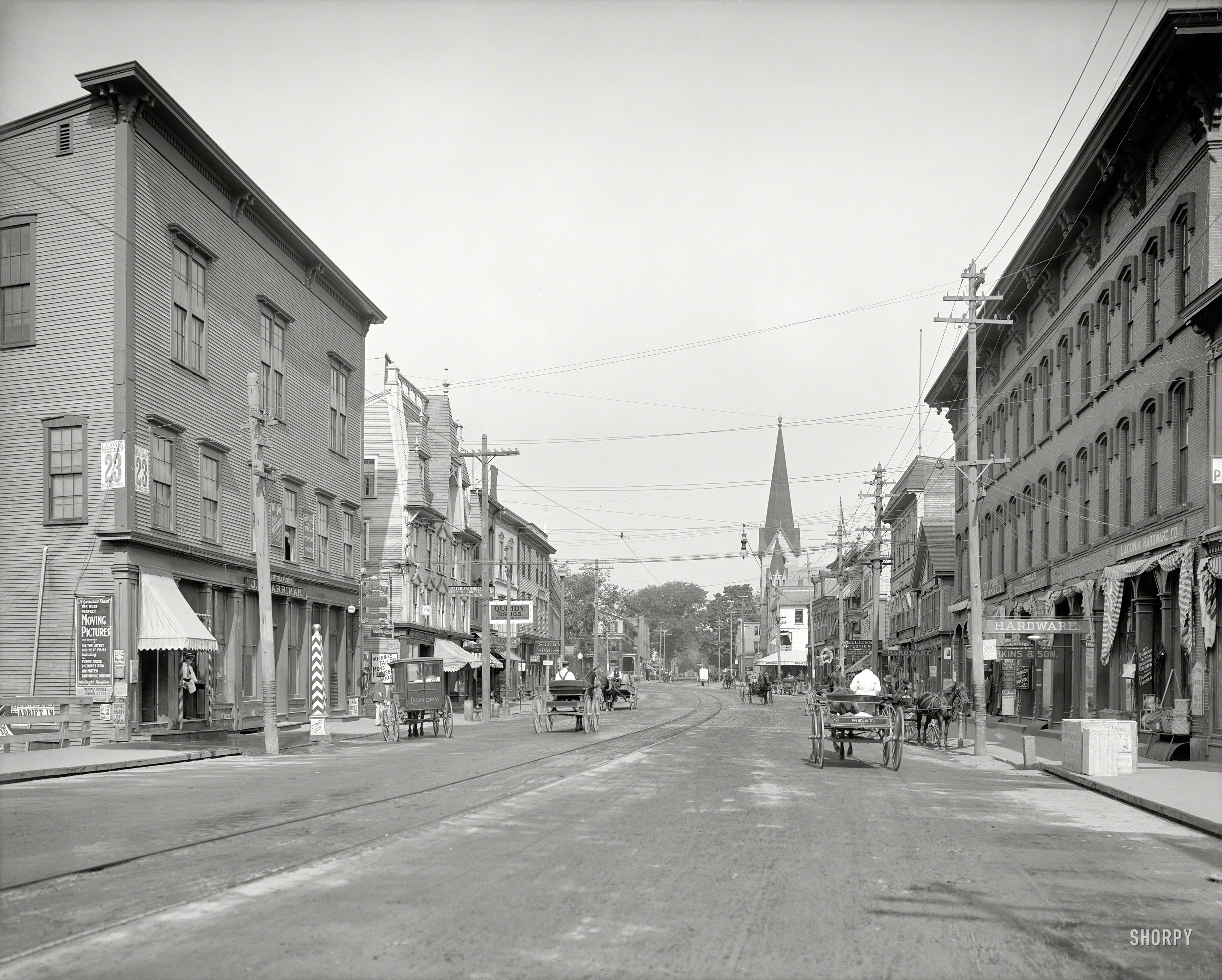 Circa 1907. "Laconia, New Hampshire -- Main Street." A highlight here is the handbill advertising "the most perfect moving pictures" and "animated pantomimic dramas" at the Folsom Opera House. View full size.