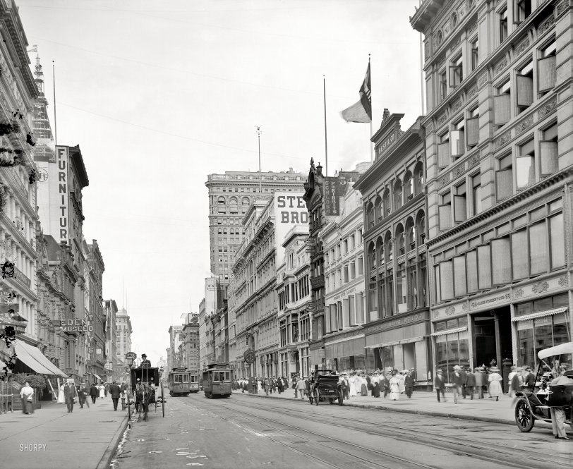 New York circa 1908. "West 23rd Street from Sixth Avenue." Two landmark skyscrapers on view -- the Flatiron Building at right and Metropolitan Life tower going up at left. At No. 62: The Best &amp; Co. "Liliputian Bazaar." View full size.
