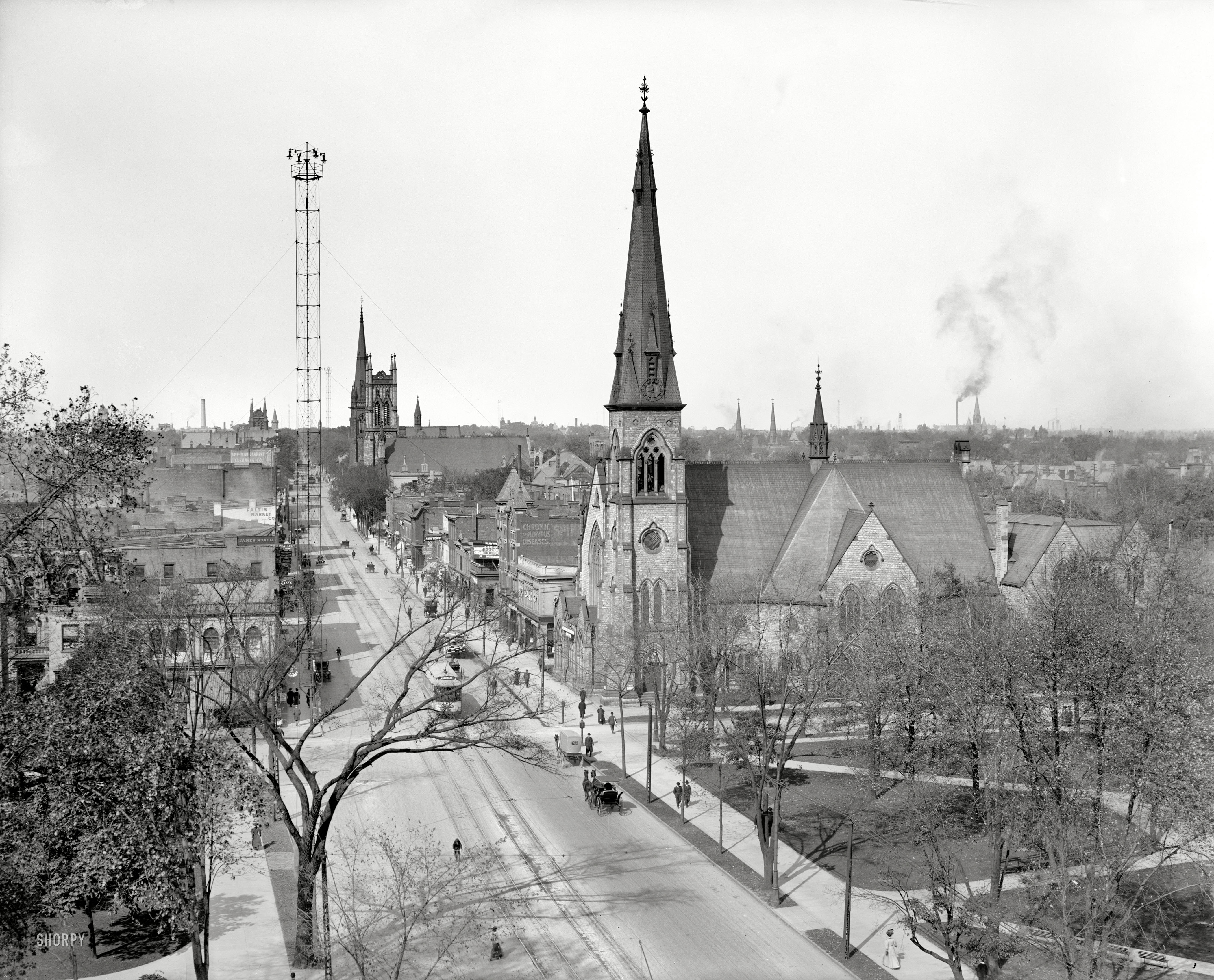 Detroit circa 1908. "Up Woodward Avenue from Grand Circus Park." A record number of "moonlight tower" arc lamp standards on view here. 8x10 inch dry plate glass negative, Detroit Publishing Company. View full size.