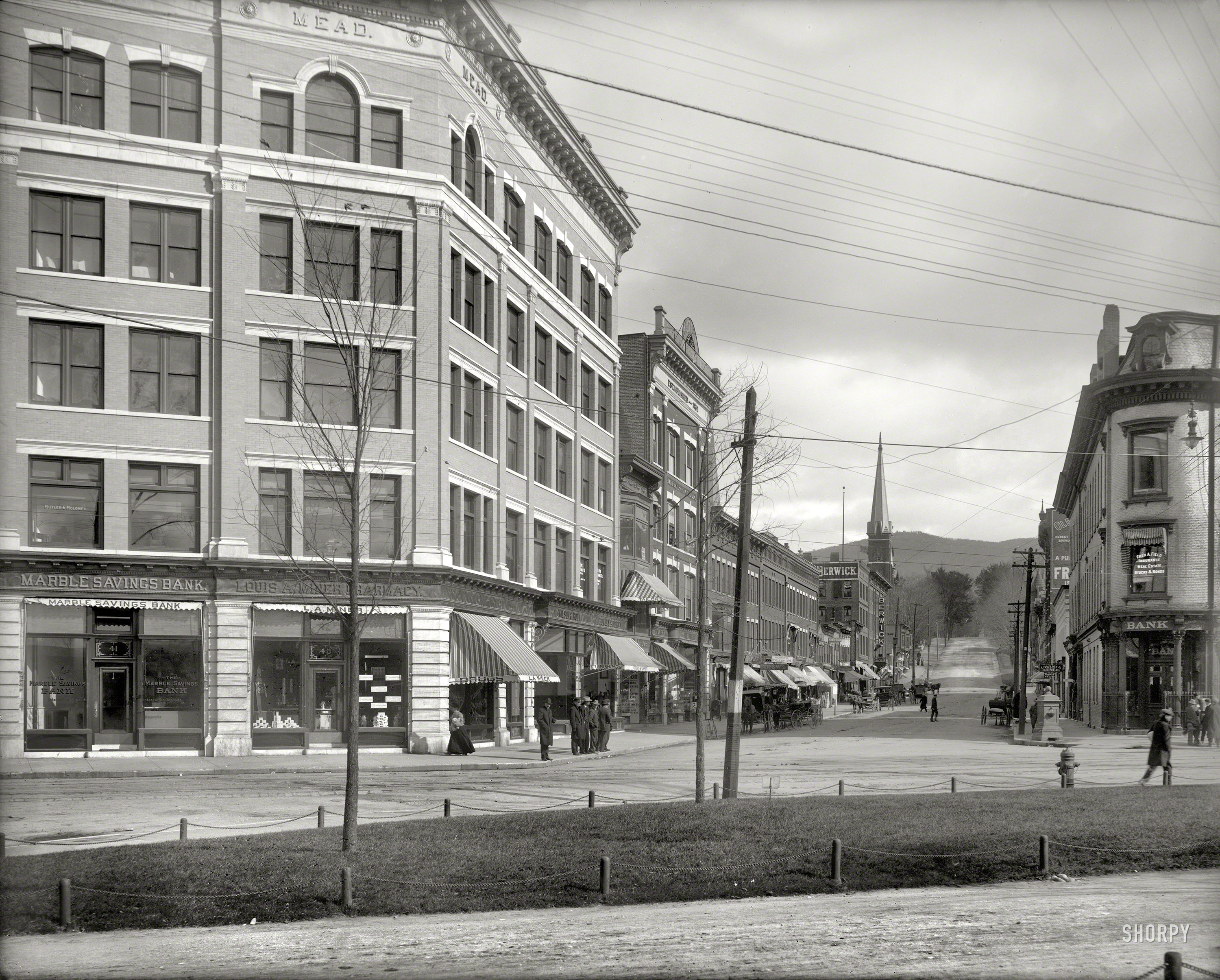 Circa 1905. "Rutland, Vermont -- Center Street." Our title comes from the eatery on the right. 8x10 glass negative, Detroit Publishing Co. View full size.