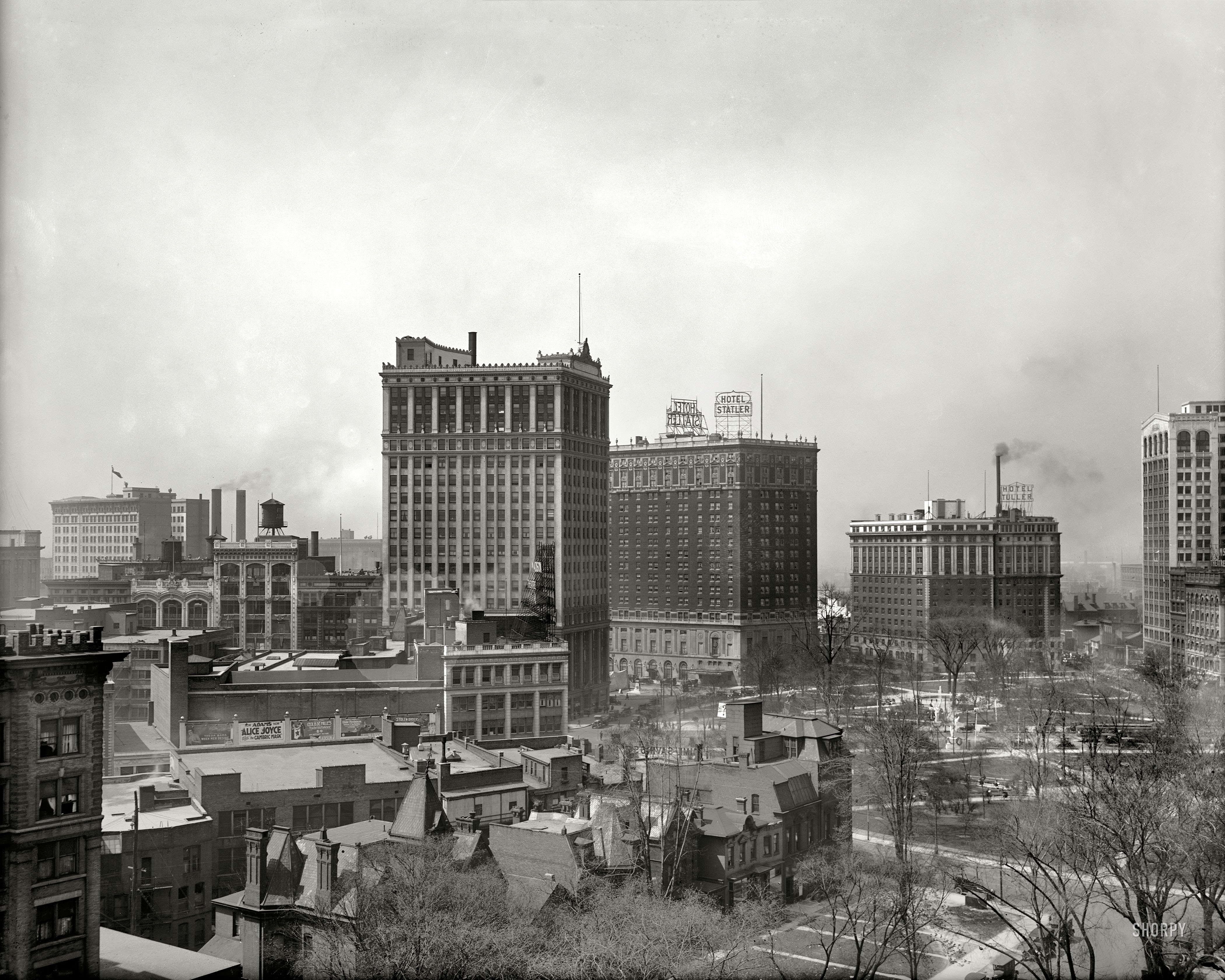 Detroit circa 1919. "Grand Circus Park from Detroit Athletic Club." The Statler and Tuller hotels, and the two Winged Victory statues seen here. Photoplays being advertised include "When Men Desire" starring Theda Bara, Alice Joyce in "The Cambric Mask," Cecil B. DeMille's "For Better, For Worse," Elsie Ferguson in "Eyes of the Soul," and "Stolen Orders."  8x10 glass negative. View full size.
