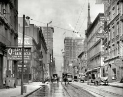 Circa 1910. "Fourth Street, Cincinnati, Ohio." Home to merchants trading in a variety of goods and services, the most esoteric of which might be "Ostrich Feathers & Boas, Cleaned, Dyed and Curled." 8x10 glass plate. View full size.