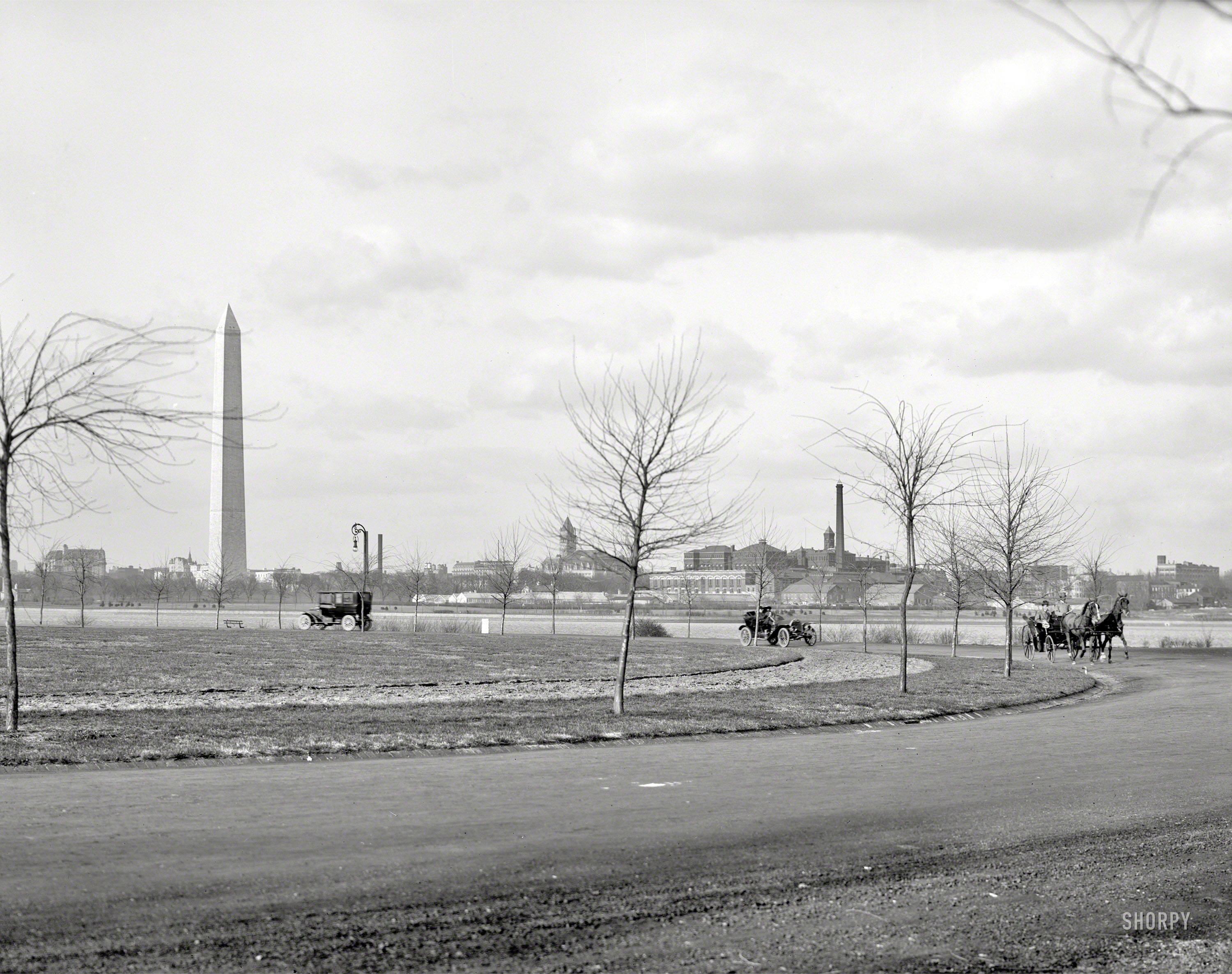 Circa 1908. "The Boulevard, Potomac Park, Washington, D.C." Various national landmarks in a strikingly uncrowded capital. 8x10 glass negative. View full size.