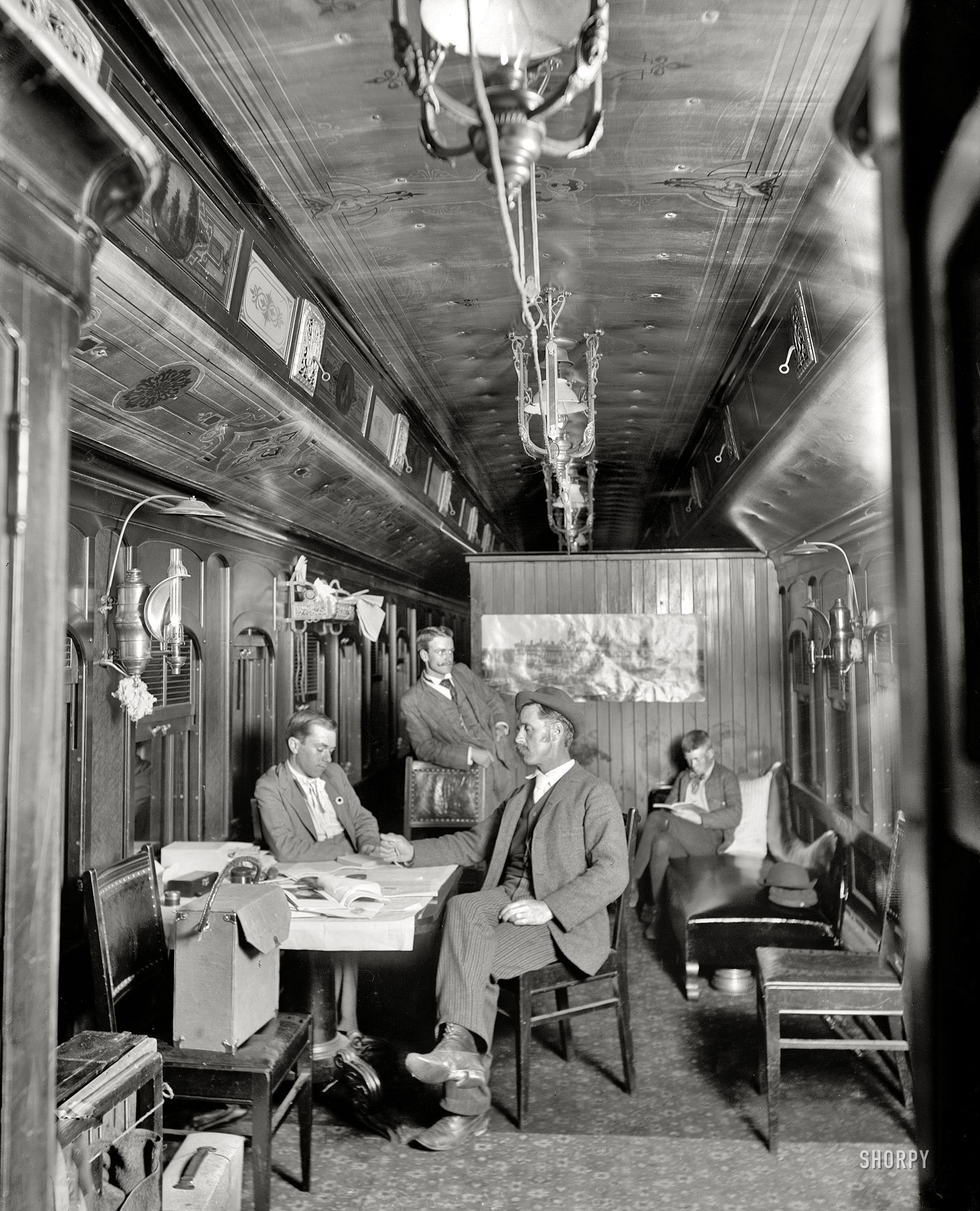 Circa 1900. "New York Central R.R. photographic car." Possibly one of the "specials" reserved by DPC for the use of its photographers as they traveled around the Northeast. Detroit Photographic Co. glass negative. View full size.
