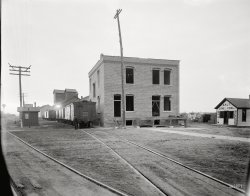 Chelsea, Michigan, circa 1901. "Glazier Stove Company -- an adjacent building." The stove empire seems to be expanding. And for you cyclists: Please, no bikes on the railroad right-of-way. 8x10 inch glass negative. View full size.