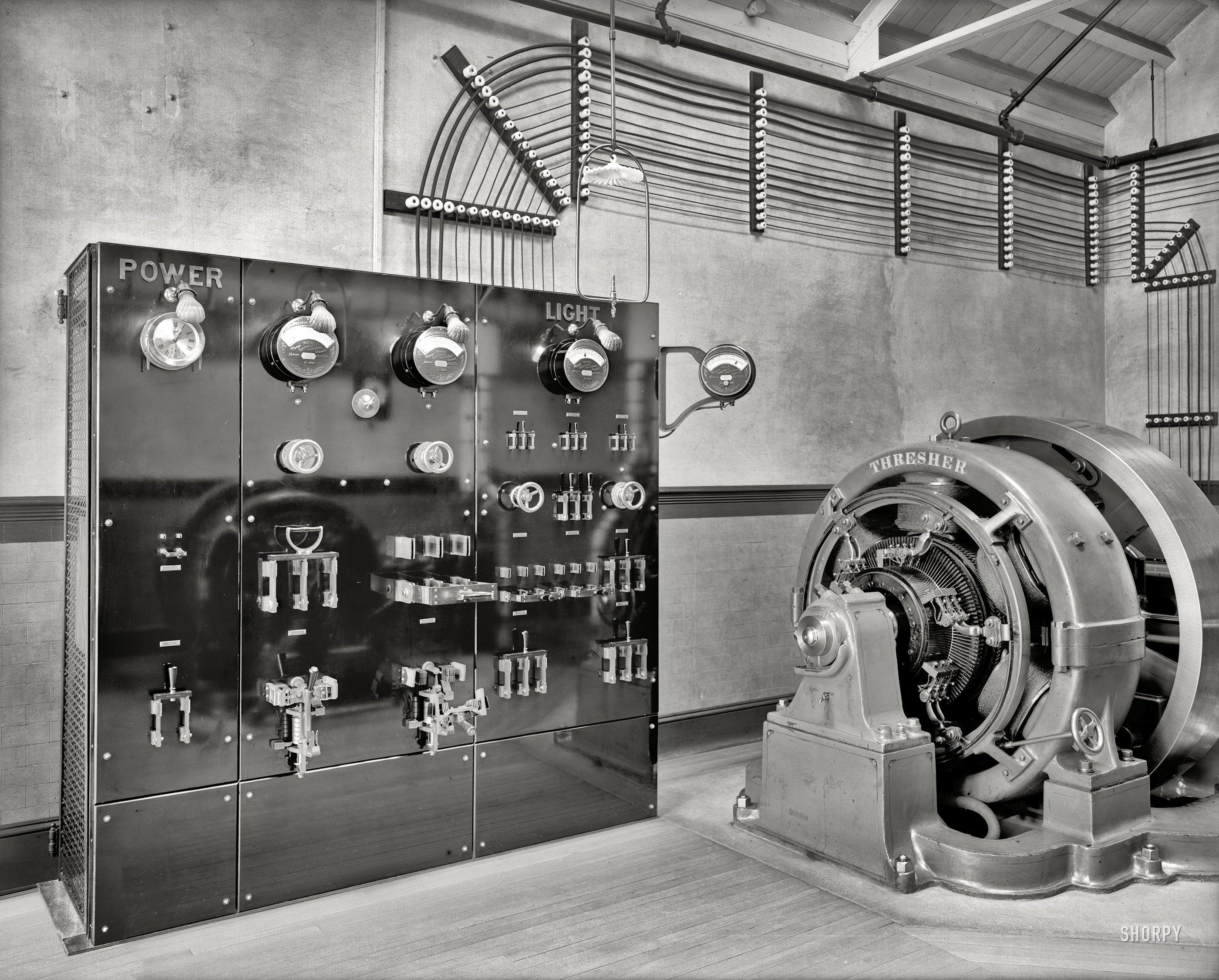 Circa 1904 somewhere in North America. "Switchboard in dynamo room." (UPDATE: Also seen here.) 8x10 inch glass negative. View full size.