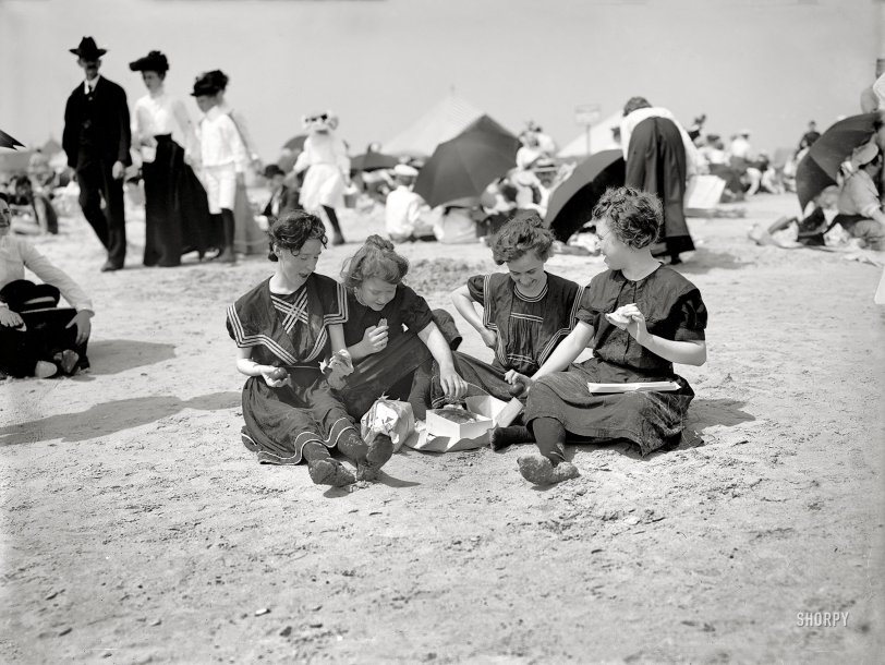 Coney Island, New York, circa 1905. "Picnicing on the beach -- a hasty lunch." 8½ x 6½ inch dry plate glass negative, Detroit Publishing Company. View full size.
