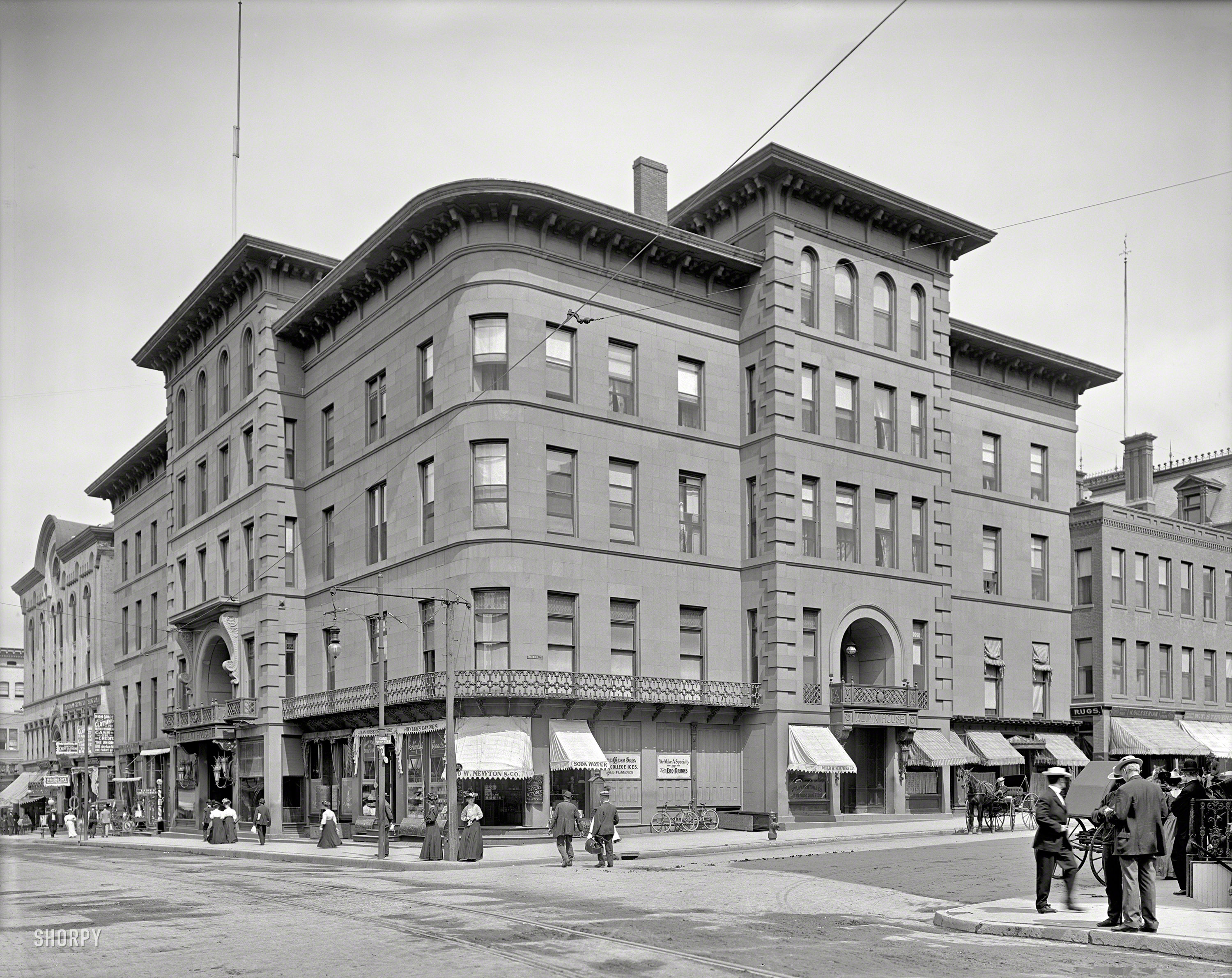 Circa 1908. "Allyn House, Hartford, Conn." At the drug store: Egg Drinks and "College Ices." 8x10 glass negative, Detroit Publishing Company. View full size.