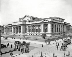 The New York Public Library under construction circa 1908, sans Patience and Fortitude. 8x10 inch glass negative, Detroit Publishing Company. View full size.
No lionsAnd no ghosts, either.  High speed camera?
Modernity1908 - an interesting time in America.  The first decade of a new century, with memories of the Civil War finally beginning to recede into the past.  We look at this photo from 103 years later, and we see the horses and buggies, the lone automobile chugging its way down the street, the bowler hats and the ankle length skirts - the indicia of a bygone, pre-war(s), pre-"modern" era.  But the people strolling along Fifth Avenue on that sunny day, near the end of the second Teddy Roosevelt administration, were "moderns" in much the same way we view ourselves today.  Electric street cars and lanterns!!  A brand new, strikingly beautiful public library to house, and make available to Everyman, the store of the world's knowledge!  A broad, paved avenue in the heart of America's most urbane and sophisticated metropolis!  Well-dressed cosmopolitans touching their hats as they pass one another on the bustling boulevard!  
These folks - like us - were riding the cusp of history, a time of enlightenment and civic improvement and technological advancement never before seen by mankind.  An exciting time to be alive!
Probably Not in Plastic BottlesI was immediately drawn to the Briarcliff Table Water wagon.  It appears that folks wanted bottled water even back then!
I&#039;ll get you my pretty!From the women's clothing and their severe faces, one has to wonder if the building is being used to clone the Wicked Witch of the West (Margaret Hamilton as Miss Gulch - a great actress).
Doomed to failBriarcliff Bottled Water - now there's a business doomed to fail.  Who would ever pay for bottles of water? Also, do the lion heads on the windows all have names?
Where there&#039;s smokeThe old gaslight at the bottom right has a glass globe that is a dark colour, which I suspect is red. On the light standard there appears to be a fire alarm telegraph box. These have disappeared in most cities. Are they still used in New York City? 
Rooftop SpareLove the spare tire on the roof of the car on the left.
iPadLooks like a time traveller in the lower left corner checking his iPad.  Maybe he's reading about the death of Steve Jobs, or maybe he's looking at himself on Shorpy.  Great picture!
Time fliesAs usual so many things to comment on in a great photo. For starters the glass vault in the lower right hand corner, the old style low pressure fire hydrants, the soon to change street lighting, The old Gamewell combination police and fire call boxes. In about 15 years all this would be gone with the next wave of municipal design and last until the 1960s.
 PS. Has anyone run across photos of the old Croton Resevoir which took up the site the library and Bryant Park now occupy.
DutiesOne almost gets the feeling that the two policemen were there to control the wheeled traffic and not the pedestrians.  People seem to be able to just cross the street wherever and whenever they wished.  And, thanks to all the bowlers, you can see why people would choose a red carnation as a guide to meeting someone they didn't know.  "I'll be at 42nd and Fifth, wearing a brown bowler" just won't work.
Some ObservationsThe bottled water wagon passing the former reservoir site. The hotel Albany smack in the middle of what would become Bryant (as in William Cullen) Park. The aforequestioned fire alarm boxes have been gone for years and all the parking meters are being removed, replaced by a credit-card-capable something called a "Muni Meter."
A Song Inspiration 
Mister Loesser used to tell his song writing grandson, Frank, how he would spend his free afternoons whistling a happy tune on NY city street corners and looking for a well turned ankle.
In 1956 Frank took his grandfather's story and turned it into a number three hit tune on each of the various charts at the time.
(The Gallery, DPC, NYC, Streetcars)