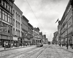 Toledo, Ohio, circa 1909. "Summit Street." Our second glimpse along this bustling retail corridor, home to the Taft Dental Parlors, Baltimore Lunch, Kugler's, Stein's and Mockett's. 8x10 glass negative, Detroit Publishing Co. View full size.