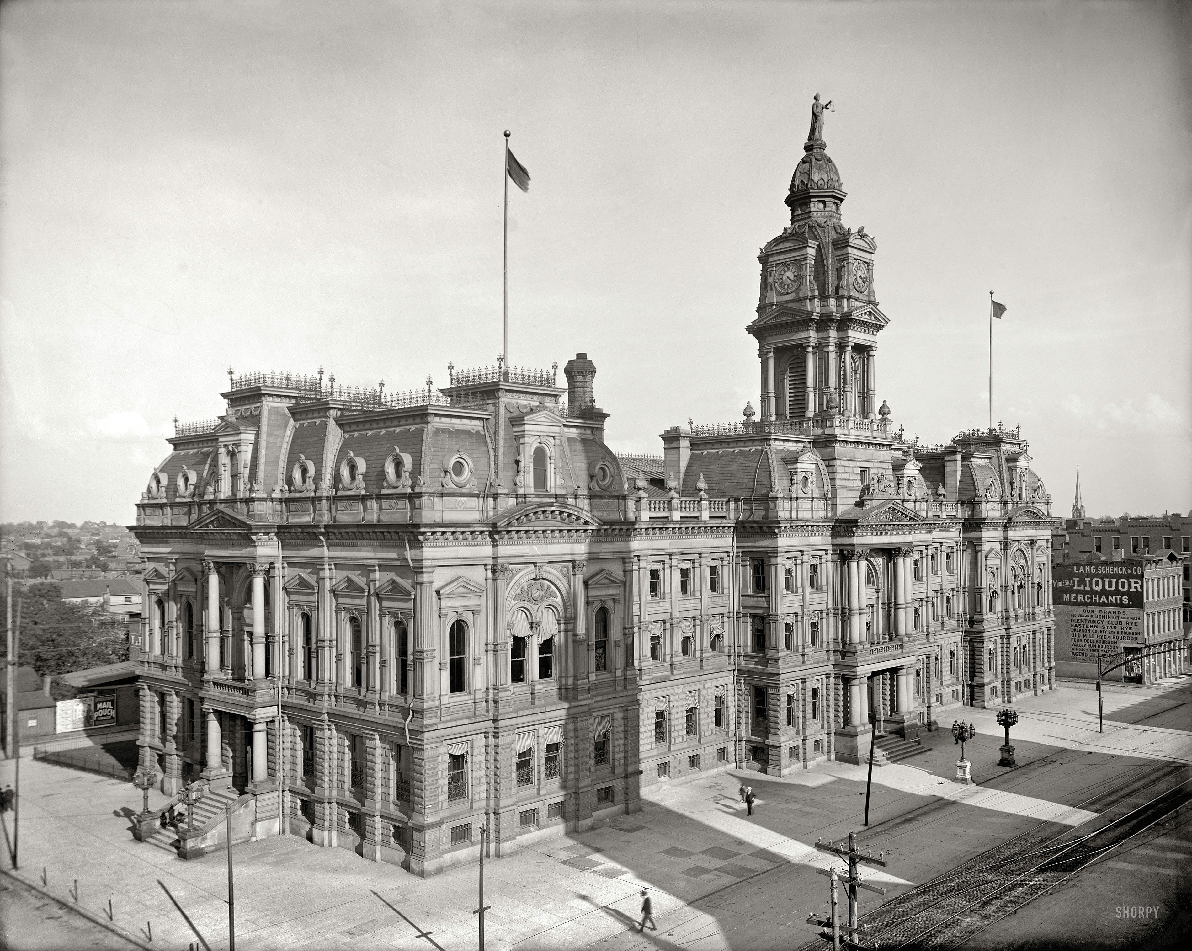 Circa 1907. "Courthouse, Columbus, O." Justice, bookended by tobacco and liquor. 8x10 inch glass negative, Detroit Publishing Company. View full size.