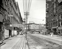 Grand Rapids, Michigan, circa 1908. "View of Monroe Street showing Hotel Pantlind." Not to mention the Candy Kitchen and Ice Cream Parlor. 8x10 inch dry plate glass negative, Detroit Publishing Company. View full size.