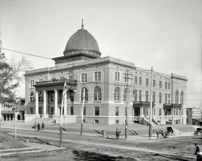 Little Rock, Arkansas, circa 1910. "City Hall." With a sampler of interesting signage, and an elaborately rigged street light. 8x10 glass negative, Detroit Publishing Company. View full size.
