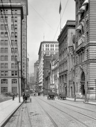 Pittsburgh, Pennsylvania, circa 1914. "Sixth Avenue above the Nixon Theatre." Home to the Nixon Cafe. Note the theater's "digital" carriage call. 8x10 inch dry plate glass negative, Detroit Publishing Company. View full size.