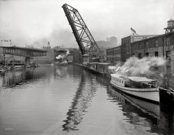 Cleveland, Ohio, circa 1912. "Cuyahoga River. The Lift Bridge and Superior Avenue viaduct." 8x10 glass negative, Detroit Publishing Co. View full size.