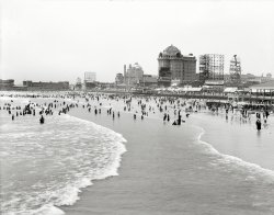Atlantic City circa 1911. "Bathing in front of the Traymore." As well as giant billboards advertising various products both funct and defunct. 8x10 inch dry plate glass negative, Detroit Publishing Company. View full size.