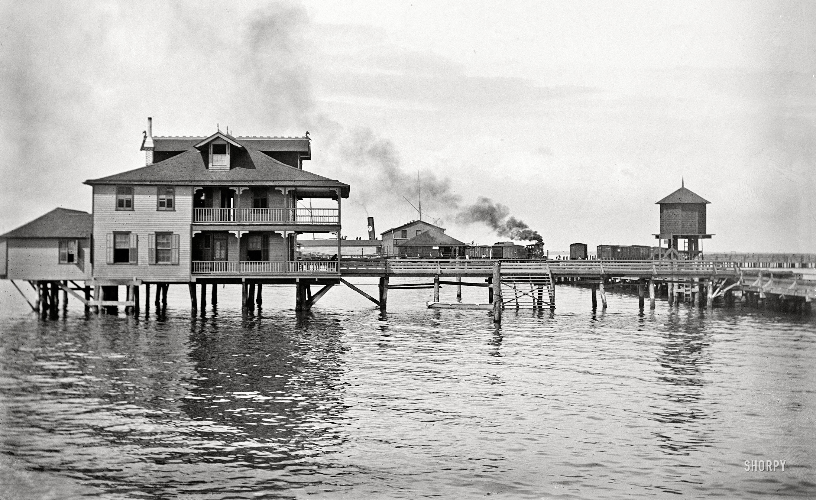 Florida circa 1890s. "Tampa Pier." A house on the water. 5x7 inch dry plate glass negative by William Henry Jackson Detroit Publishing Co. View full size.