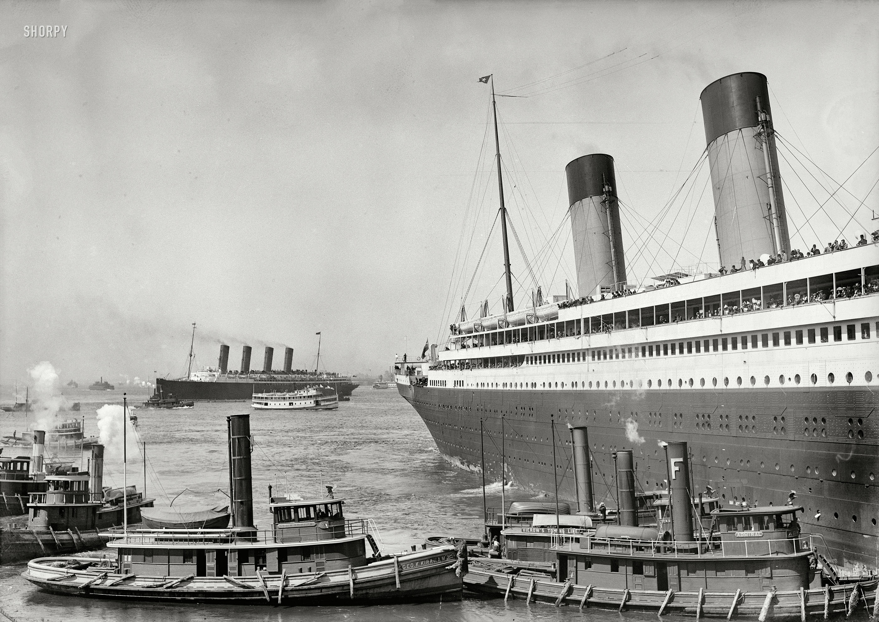 New York. June 21, 1911. "White Star liner S.S. Olympic guided by tugboats Kirkham and Admiral." Detroit Publishing glass negative. View full size.