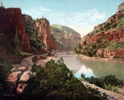 "Echo Cliffs, Grand River Canyon, Colorado." Photochrom print published in 1914 from a glass negative taken many years earlier by William Henry Jackson, whose Western views, developed in his railcar-darkroom, formed the basis of Detroit Photographic's holdings in the company's early years. View full size.