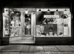 New York, 1920. "Graham shop." Store window display of the Graham Talking Machine Co. at 75 Graham Avenue in Brooklyn. Among the titles you could take for a spin: "Ever of Thee I'm Fondly Dreaming," "Drowsy Baby" and "My Little Bimbo Down on the Bamboo Isle." Who'll be the first brave soul to attempt a Nipper count? 5x7 glass negative, Bain News Service. View full size.