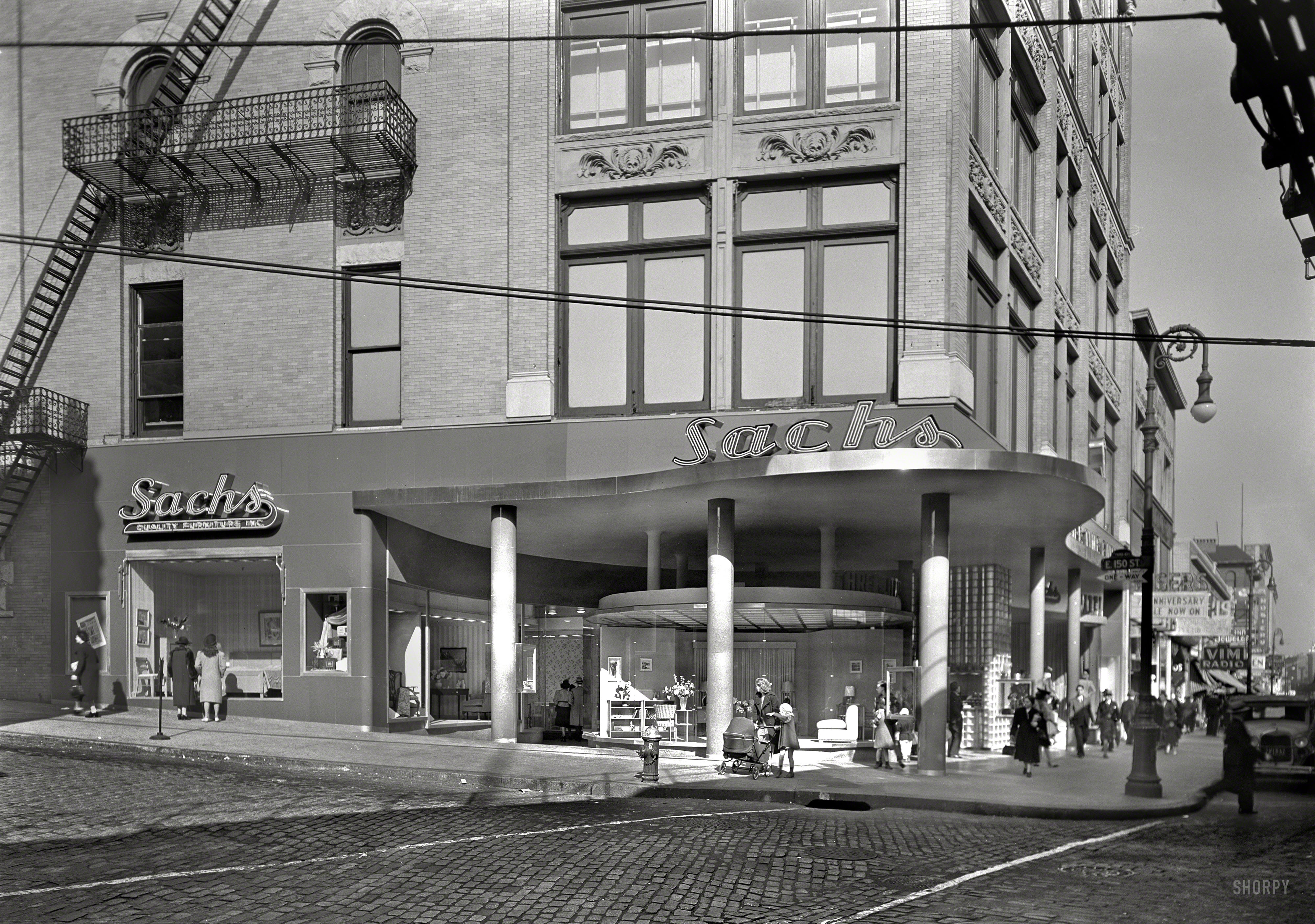 November 5, 1940. "Sachs Quality Furniture Inc., 150th Street & Third Avenue, New York. General exterior, daylight. Morris Lapidus, Ross-Frankel Inc., clients." Large-format acetate negative by Gottscho-Schleisner. View full size.