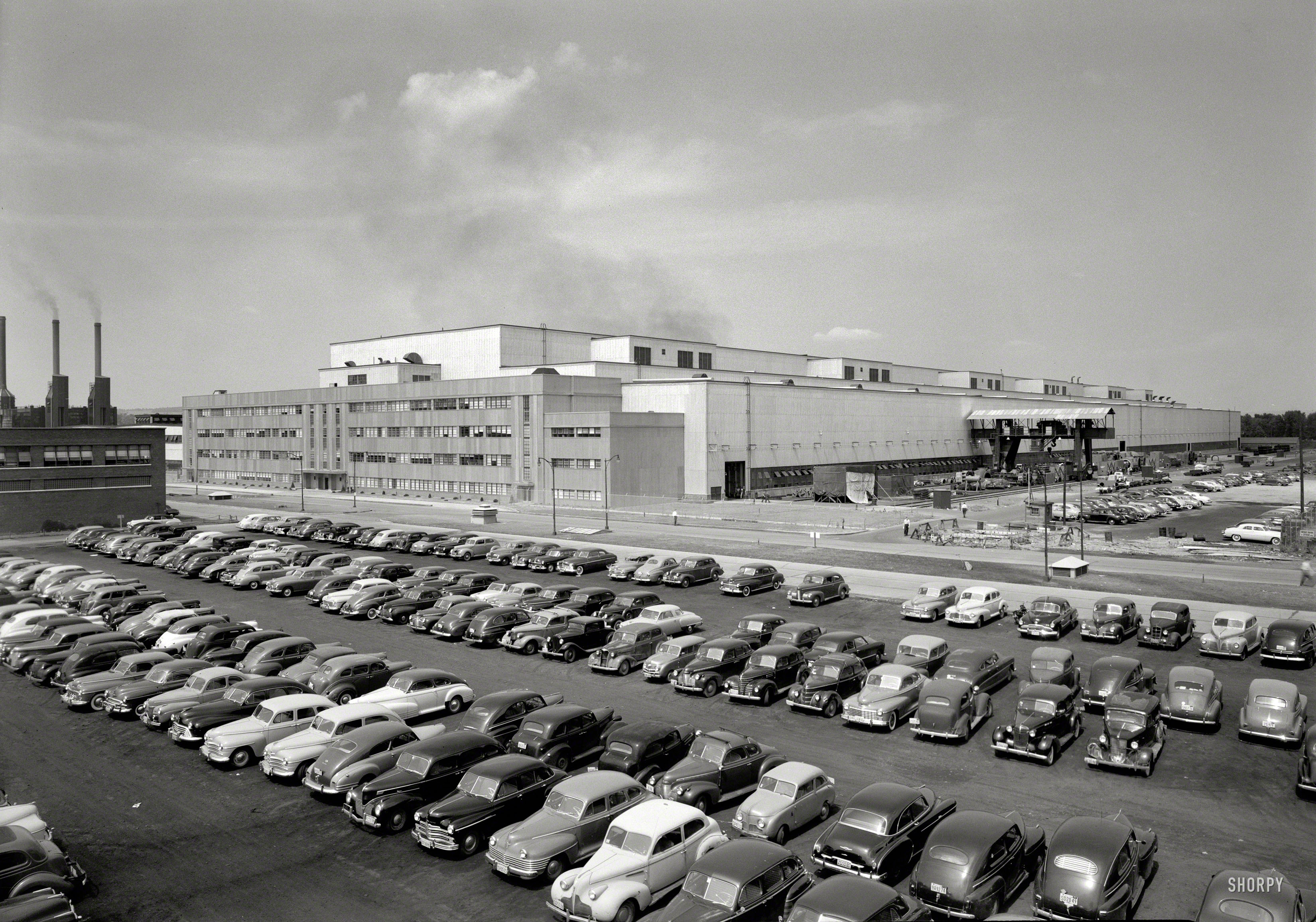 August 4, 1949. "General Electric turbine plant, Schenectady, New York." Calling all car-spotters! Large-format negative by Gottscho-Schleisner. View full size.