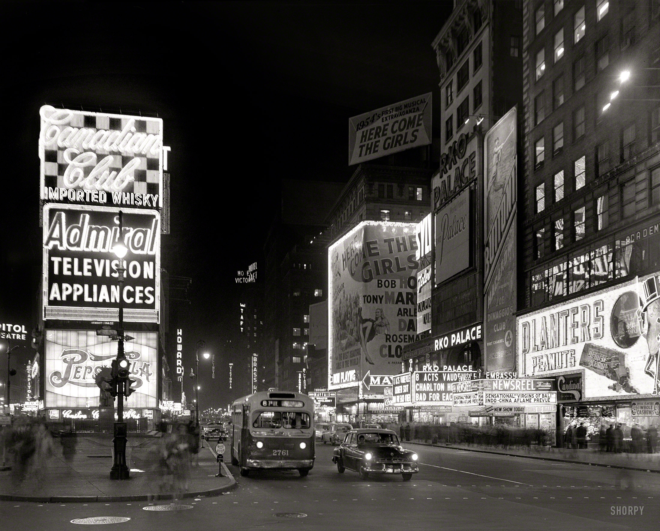 Dec. 29, 1953. "New York City views. Times Square at night." Let's meet at the Brass Rail. 4x5 acetate negative by Gottscho-Schleisner. View full size.