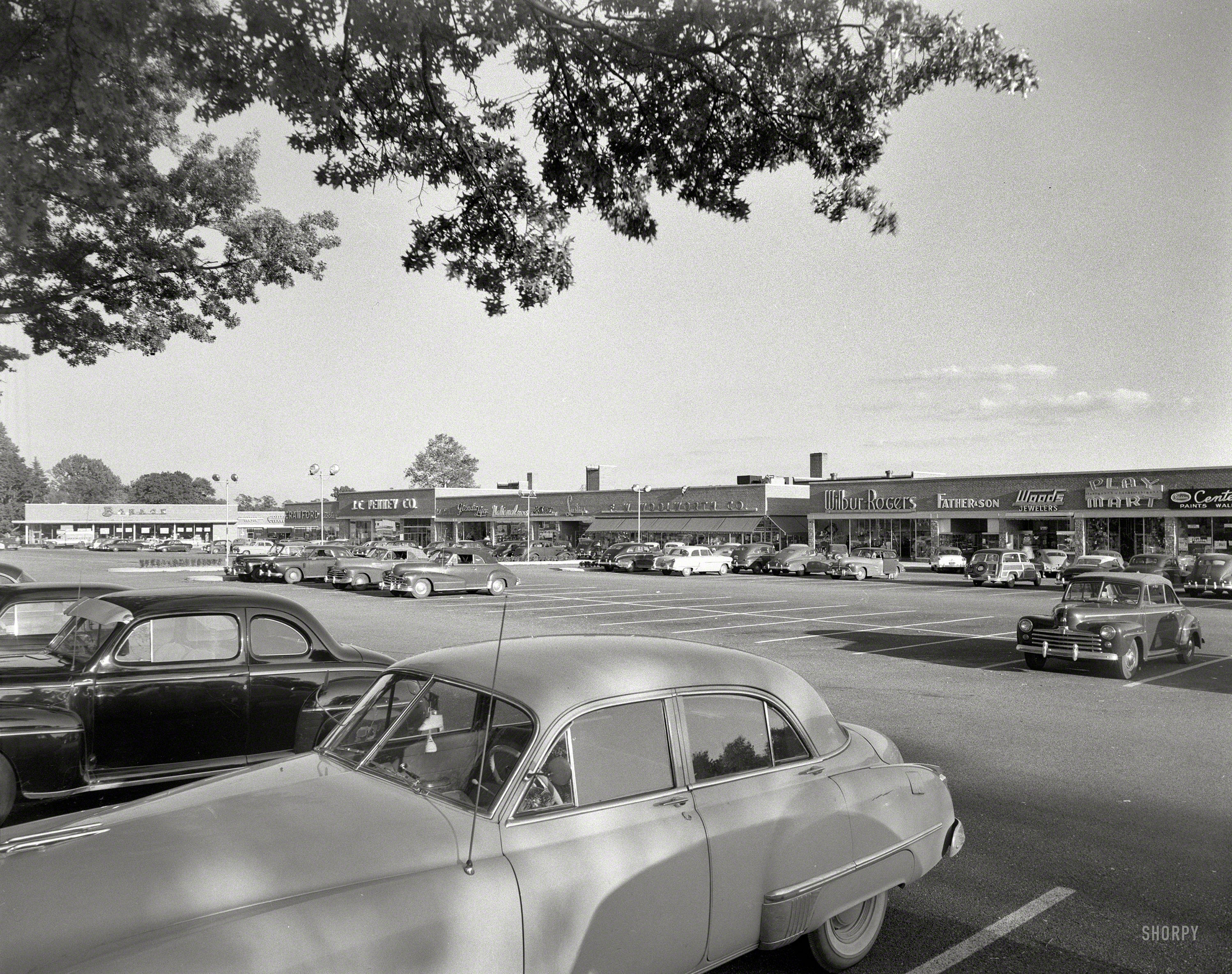 Sept. 27, 1954. Smithtown, New York. "Smithtown Shopping Center. General view." Meet you at Play Mart in an hour. Gottscho-Schleisner photo. View full size.