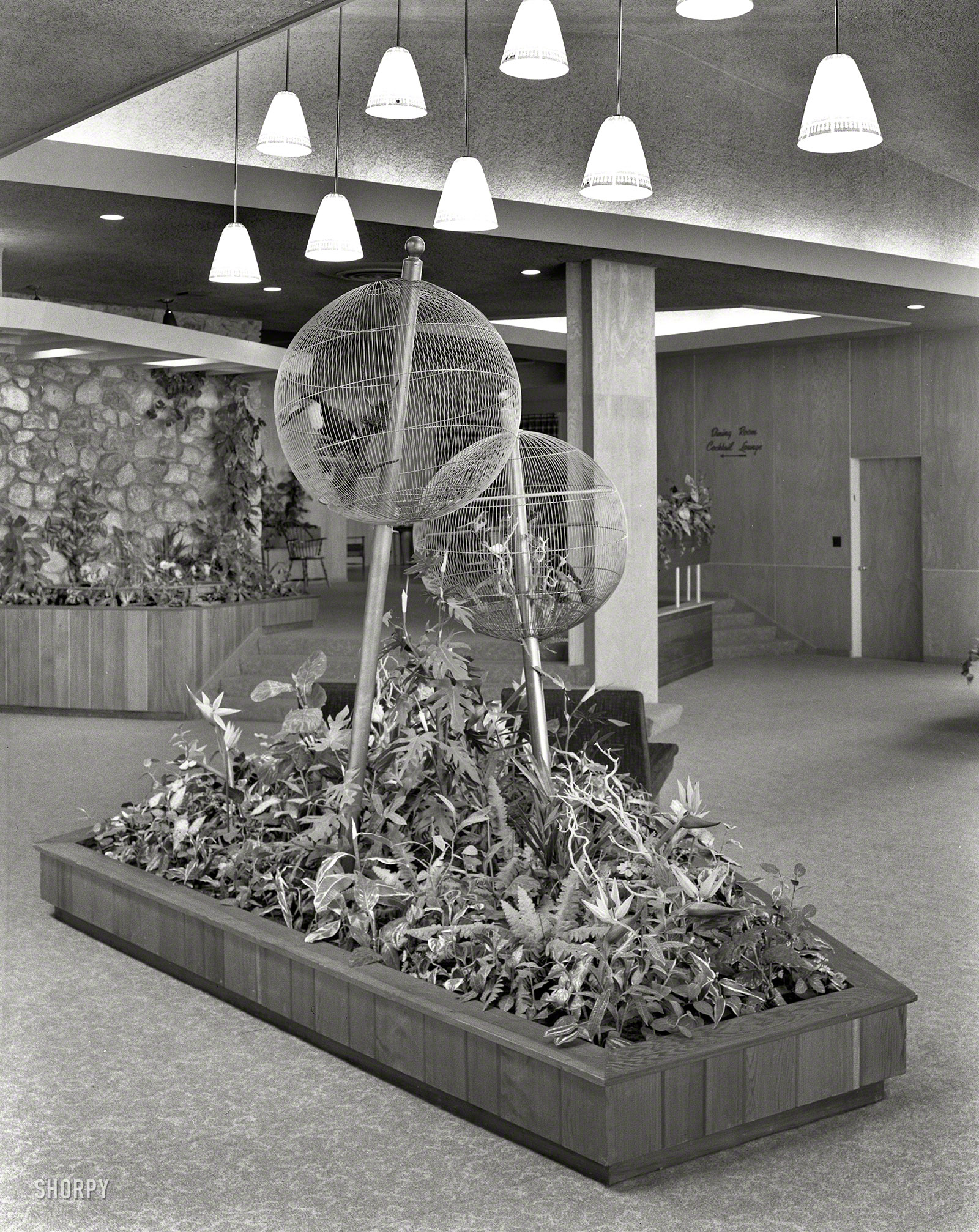 August 13, 1957. "Tamarack Lodge, Greenfield Park, New York. Lobby to cages." Another defunct Catskills resort. Gottscho-Schleisner photo. View full size.