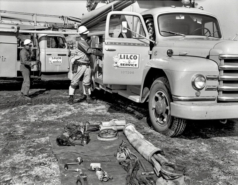 March 3, 1959. "Long Island Lighting Co. trucks and men." A Diamond T truck bearing the likeness of Lilco's "Lil." Photo by Gottscho-Schleisner. View full size.
