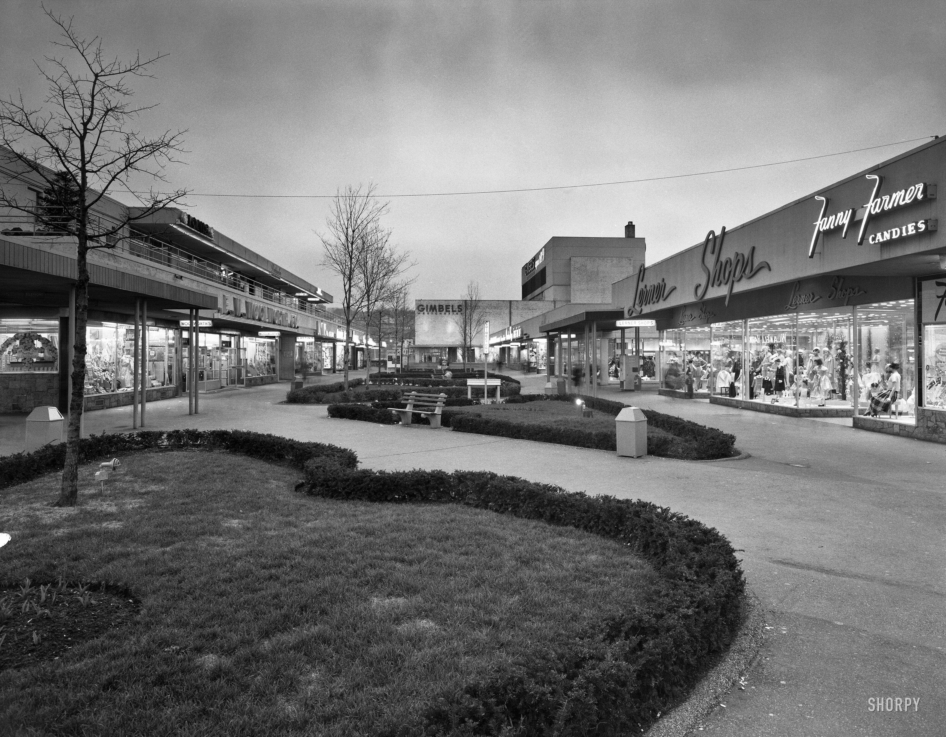 April 13, 1959. "Cross County Center. Yonkers, Westchester County, New York. Dusk. Lathrop Douglass, client." Fanny Farmer, Woolworth's, Lerner Shops -- it's hard to know where to begin! Gottscho-Schleisner photo. View full size.