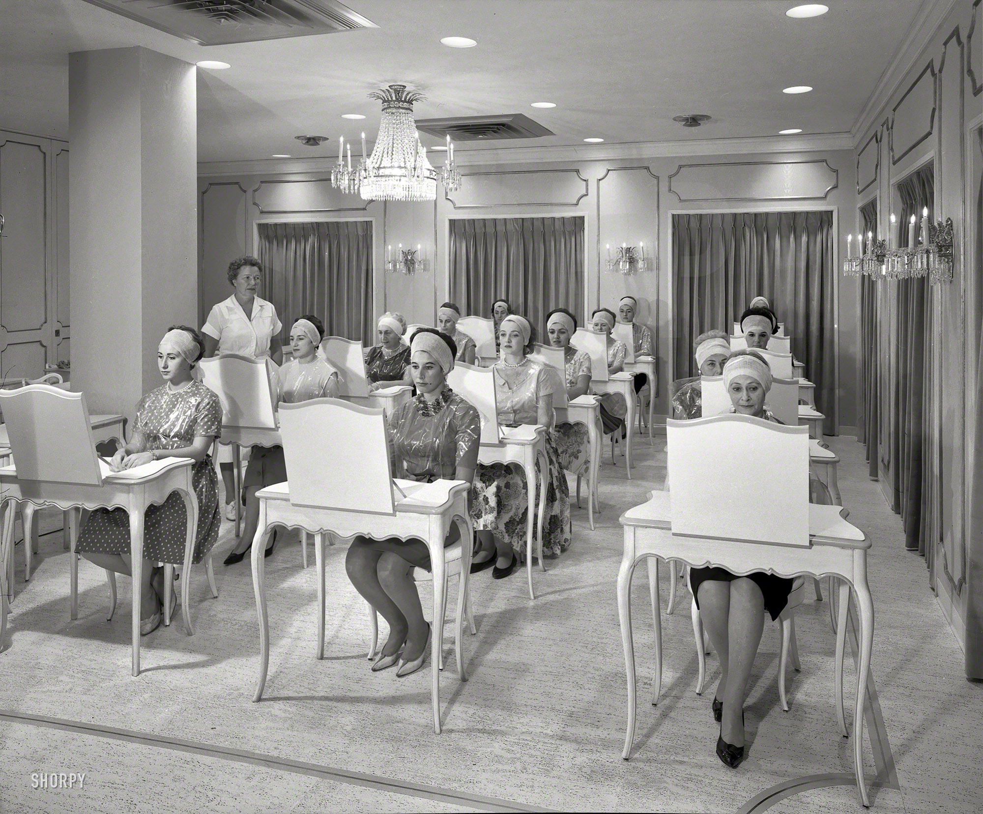 September 15, 1961. "Helena Rubinstein, 655 Fifth Avenue, New York. Class in session." Large-format acetate negative by Gottscho-Schleisner. View full size.