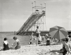 Circa 1940. "Beach with sunbathers." Chapel Point, Washington's "playground on the Potomac" near La Plata, Md. Photo by Theodor Horydczak. View full size.