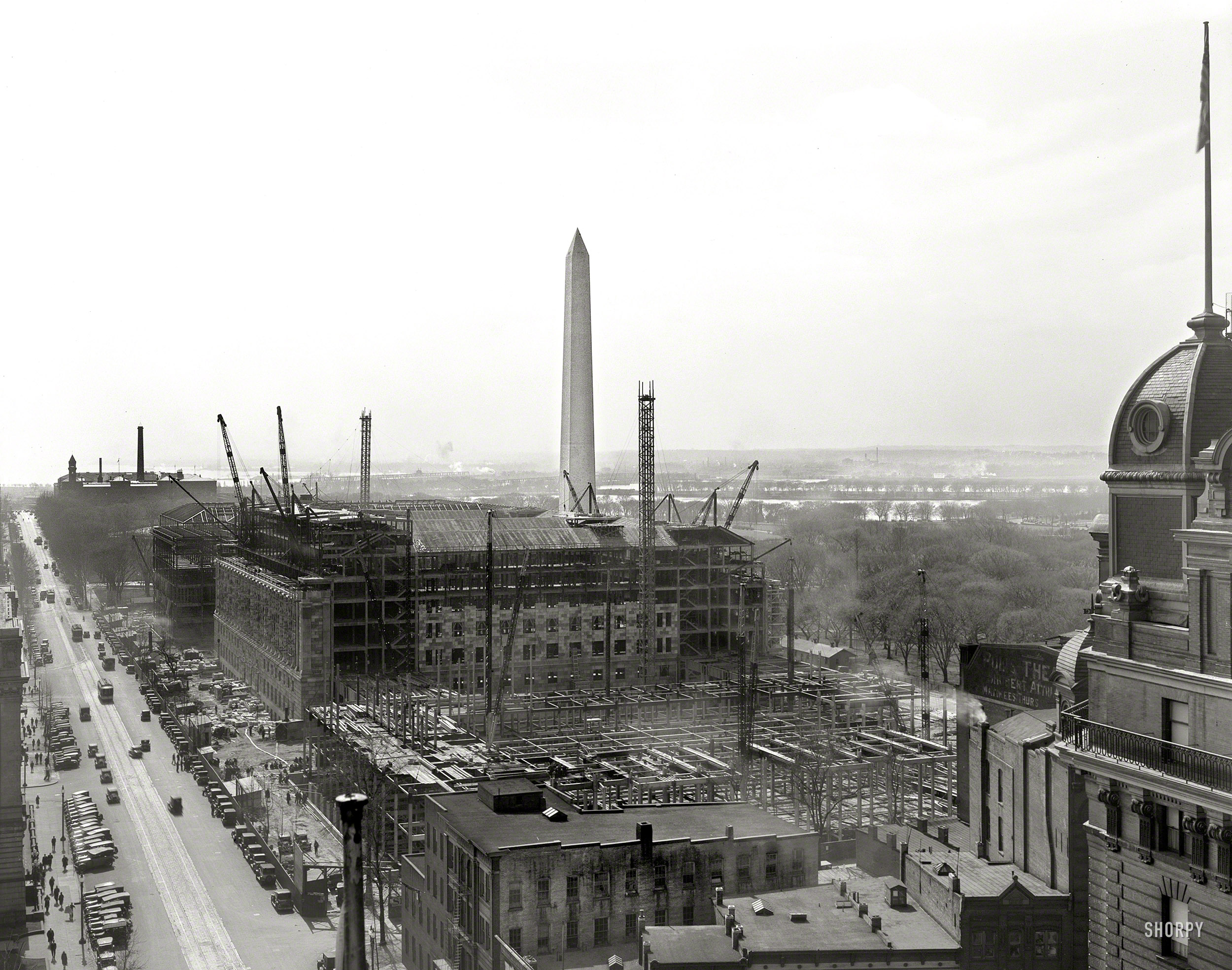 Washington, D.C., circa 1931. "Department of Commerce under construction from top of National Press Building looking down 14th Street." Willard Hotel at right. Large format negative by Theodor Horydczak. View full size.