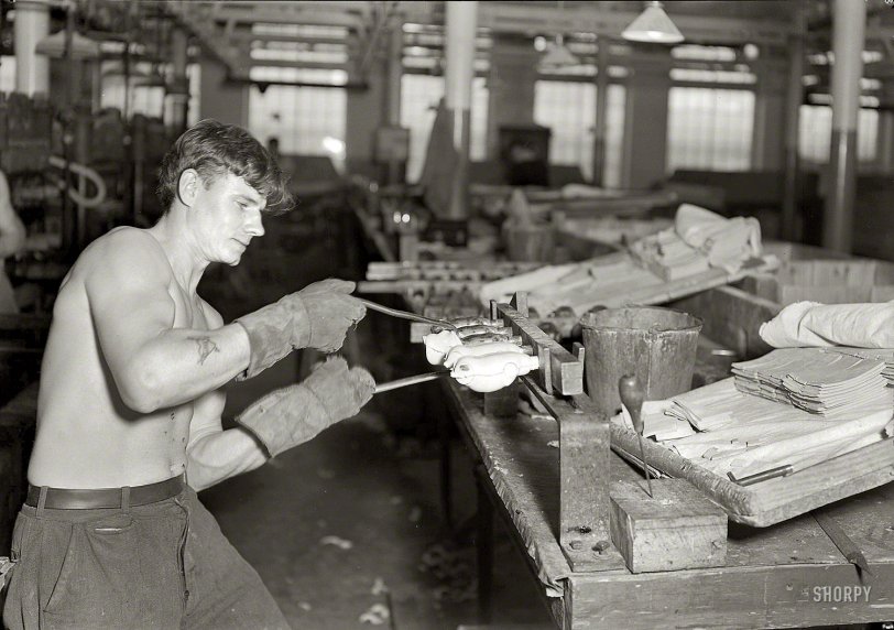 1936. "Mt. Holyoke, Mass. -- Paragon Rubber Co. and American Character Doll. Stripping rubber bodies off core-bars (French)." Alternate title: "French Stripper." Our second look at Mr. LOVE Tattoo. Photo by Lewis Hine. View full size.
