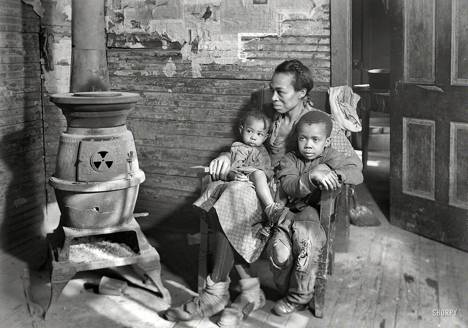 March 1937. Scott's Run, West Virginia. "Johnson family -- father unemployed." Photograph by Lewis Wickes Hine. View full size.