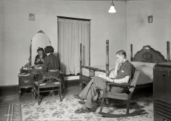 1936. High Point, North Carolina. "Housing. Bedroom in company-owned home of workers in Highland Cotton Mills. This is one of the best there." Who are the glamor girls on the wall? Photograph by Lewis Wickes Hine. View full size.