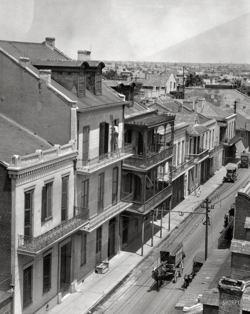 New Orleans circa 1923. "View of a street and roofs." Also an ice wagon whose horse is wearing a hat. Bonus points if you can identify the street. Nitrate negative by Arnold Genthe. View full size.
