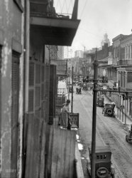&nbsp; &nbsp; &nbsp; &nbsp; Thanks to our commenters, we've zeroed in on the location: the 500 block of Royal Street.
Circa 1923. "Street scene, New Orleans." Who can name the street? It has a nice view of the Hibernia Bank tower. Photo by Arnold Genthe. View full size.