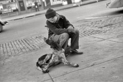 November 1938. "Boy with dog. Omaha, Nebraska." 35mm nitrate negative by John Vachon for the Farm Security Administration. View full size.