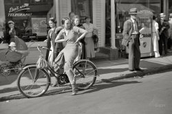 Summer 1937. "Street scene -- Provincetown, Massachusetts." And a reminder to "Don't write -- Telegraph!" 35mm negative by Edwin Rosskam. View full size.