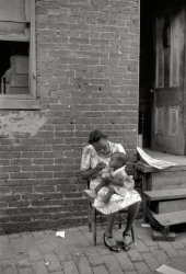 July 1941. "Mother and child. Alley dwelling area. Washington, D.C." Happy Mother's Day from Shorpy! Photo by Edwin Rosskam. View full size.