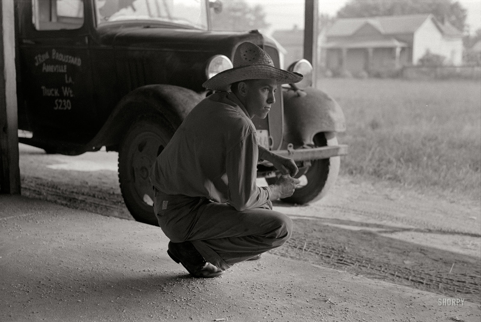 September 1938. Abbeville, Louisiana. "Farmer's truck at state rice mill." 35mm negative by Russell Lee for the Farm Security Administration. View full size.