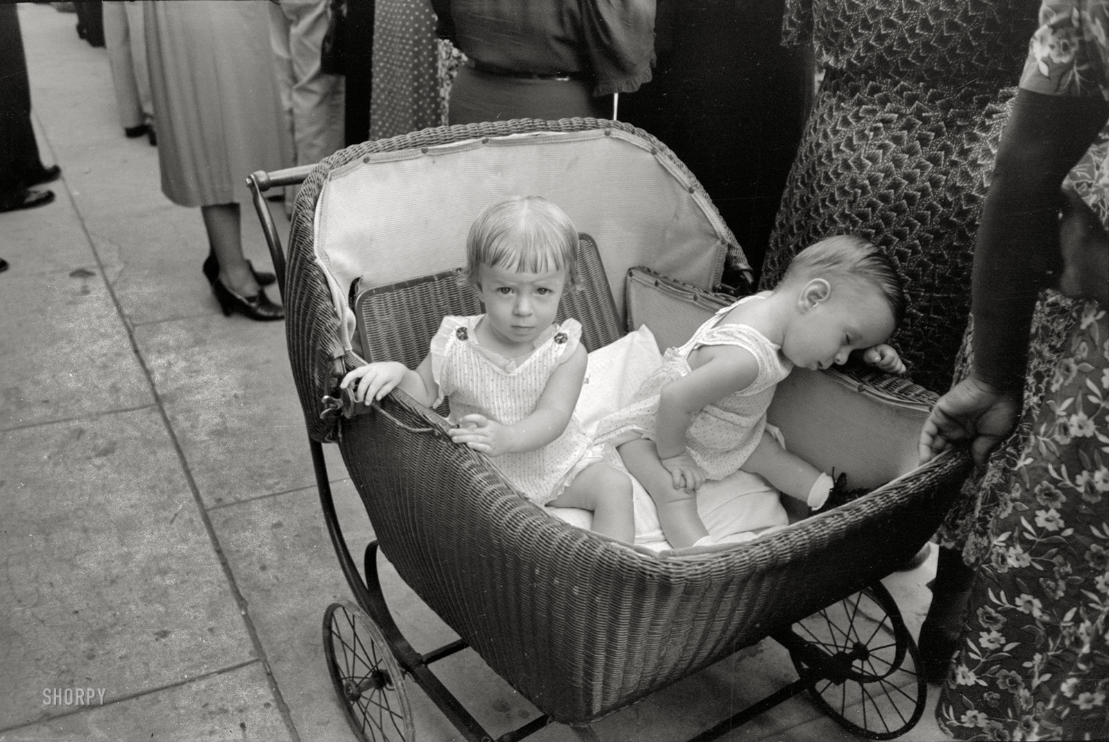 October 1938. Crowley, Louisiana. "Children in buggy at National Rice Festival." 35mm negative by Russell Lee, Farm Security Administration. View full size.