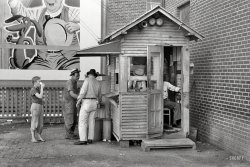 July 1939. "Activity around station master's shack. Streetcar terminal, Oklahoma City, Oklahoma." 35mm nitrate negative by Russell Lee. View full size.
